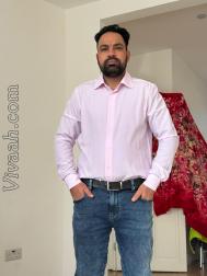 VVB5321  : Nai (Punjabi)  from  Northampton